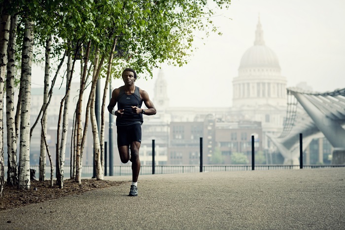 Male runner stretching