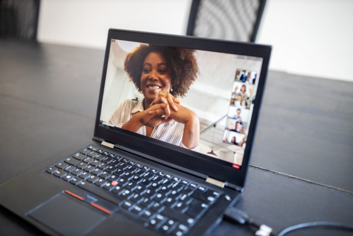 Business people brainstorming ideas during a virtual meeting